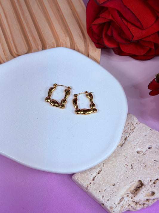 Aretes Liquid Square Glow